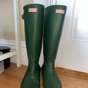 Green tall Hunter rain boots